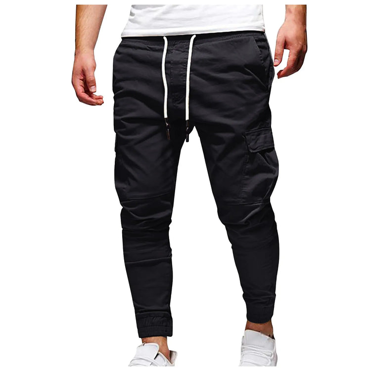 Black jogger pants with white drawstring on a white background